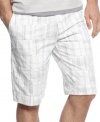 Subdued tones elevate these plaid shorts from Calvin Klein. The perfect pair for a more refined summer look.