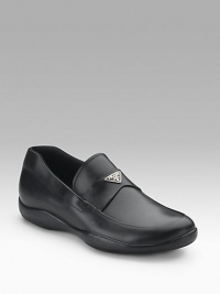 Supple calfskin with logo band across vamp. Leather lining Padded insole Rubber sole Made in Italy 