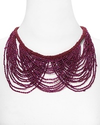 Color pop your way to cool with this beaded bib necklace from Aqua, accented by cascading purple beads. It's the piece we want bright now. Color pop your way to cool with this beaded bib necklace from Aqua, accented by cascading purple beads. It's the piece we want bright now.