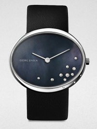 From the Vivianna Collection. A stunning, diamond detailed timepiece based on the brand's philosophy to meld design and functionality. Quartz movementWater resistant to 3 ATMRound stainless steel case, 40mm (1.6)Smooth bezel and black mother-of-pearl dial with diamond accents, .09 tcwInterchangeable black calfskin leather strap and black satin strapMade in Switzerland From the Vivianna Collection. A stunning, diamond detailed timepiece based on the brand's philosophy to meld design and functionality. Quartz movementWater resistant to 3 ATMRound stainless steel case, 40mm (1.6)Smooth bezel and black mother-of-pearl dial with diamond accents, .09 tcwInterchangeable black calfskin leather strap and black satin strapMade in Switzerland