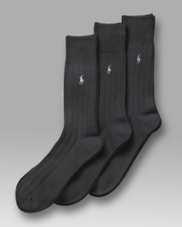 Polo Ralph Lauren 3-pack solid ribbed socks. Solid cotton ribbed sock with polo player embroidery. Banded cuffs. Polo Ralph Lauren 3-pack solid ribbed socks. Solid cotton ribbed sock with polo player embroidery. Banded cuffs.