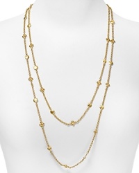 Small gold hammered discs adorn this extra long chain necklace with a faux openwork motif, making it the perfect refined bohemian piece to layer, double, or even triple. From Lauren Ralph Lauren. Small gold hammered discs adorn this extra long chain necklace with a faux openwork motif, making it the perfect refined bohemian piece to layer, double, or even triple. From Lauren Ralph Lauren.