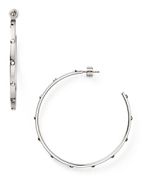 Strong but simple. This pair of silver-plated hoop earrings from Michael Kors are the perfect earrings for everyday - wear them as as shapely showpiece. Strong but simple. This pair of silver-plated hoop earrings from Michael Kors are the perfect earrings for everyday - wear them as as shapely showpiece.