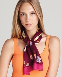 Butterflies, insects and flowers decorate this sheer oblong scarf for a whimsical touch. Butterflies, insects and flowers decorate this sheer oblong scarf for a whimsical touch.
