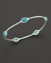 From the Silver collection, five turquoise stations on a sterling silver oval bangle. Designed by Ippolita.