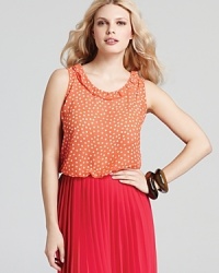 Boasting a cheery citrus hue and a playful polka-dot print, this Jones New York Collection tank energizes your daytime style. Boasting a cheery citrus hue and a playful polka-dot print, this Jones New York Collection tank energizes your daytime style.