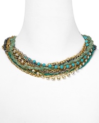 The sun-soaked tropics play must to this beaded bib necklace from ABS by Allen Schwartz. Crafted of gold-plated metal with colorful detailing, it's the perfect piece to color every look.