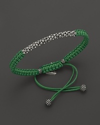 A hand braided cord bracelet in a saturated hue is adorned with Lagos' signature Caviar™ beads and finished with an adjustable closure.