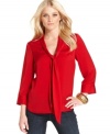A tie at the neckline adds a retro appeal to this Kensie blouse -- perfect for work and beyond!