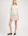 Light and soft in a luxurious heathery yarn from Italy, this effortless pullover gets added character from waist cutouts and subtle gathering.Ribbed roundneckLong sleeves with ribbed cuffsWide ribbed waist with front-to-back cutouts50% nylon/40% alpaca/10% mohairDry cleanImported of Italian fabricModel shown is 5'10 (177cm) wearing US size Small.This style runs small. We recommend ordering one size up for a standard fit. 