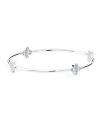 The clover-shaped stations on this delicate bangle from Crislu strike a distinctive balance between classic iconography and contemporary sparkle. The clover-shaped stations on this delicate bangle from Crislu strike a distinctive balance between classic iconography and contemporary sparkle.