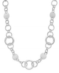 In the round. Style&co.'s long necklace conveys circular chic each time you wear it! Crafted in silver tone mixed metal, it's an alluring accessory for either daytime or evening. Approximate length: 37-1/2 inches. In the round. Style&co.'s long necklace conveys circular chic each time you wear it! Crafted in silver tone mixed metal, it's an alluring accessory for either daytime or evening. Approximate length: 37-1/2 inches.