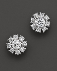 White gold diamond flower cluster earrings. With signature ruby accent. Designed by Roberto Coin.