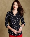 Tommy Hilfiger's chic button-front shirt features an allover dog print for a touch of whimsy.