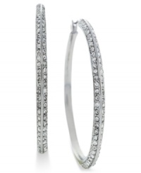 Go big and bold. These hoop earrings from Vince Camuto are crafted from silver tone mixed metal and feature rows of clear glass accents adorning the outside. Approximate drop: 3-1/4 inches. Go big and bold. These hoop earrings from Vince Camuto are crafted from silver tone mixed metal and feature rows of clear glass accents adorning the outside. Approximate drop: 3-1/4 inches.