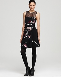 A dash of floral and a touch of lace brings this French Connection dress to the forefront of fashion. A dash of floral and a touch of lace brings this French Connection dress to the forefront of fashion.