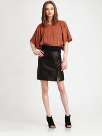 Artfully crafted with front pintucking and a keyhole detail, this billowy, silk-rich top has dolman sleeves and an elasticized back hem. Crewneck with keyhole detailDropped shouldersElbow-length dolman sleevesElastic back hem hits below the hips95% silk/5% spandexDry cleanImportedModel shown is 5'10 (177cm) wearing US size Small. Artfully crafted with front pintucking and a keyhole detail, this billowy, silk-rich top has dolman sleeves and an elasticized back hem. Crewneck with keyhole detailDropped shouldersElbow-length dolman sleevesElastic back hem hits below the hips95% silk/5% spandexDry cleanImportedModel shown is 5'10 (177cm) wearing US size Small.