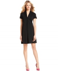 Clean lines and a soft knit create a minimalist masterpiece of a dress from Calvin Klein. Polish the look with patent leather flats or heels for a hint of shine. Clean lines and a soft knit create a minimalist masterpiece of a dress from Calvin Klein. Polish the look with patent leather flats or heels for a hint of shine.