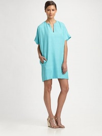 An effortless shift of solid silk canvas, slightly oversized for a modern fit.Split V necklineDropped shouldersShort sleevesFlat frontSwing backAbout 22 from natural waistSilkDry cleanImportedModel shown is 5'9½ (176cm) wearing US size Small. An effortless shift of solid silk canvas, slightly oversized for a modern fit.Split V necklineDropped shouldersShort sleevesFlat frontSwing backAbout 22 from natural waistSilkDry cleanImportedModel shown is 5'9½ (176cm) wearing US size Small.