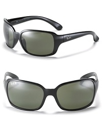 Large rectangle sunglasses with a wrap silhouette for a flattering fit and polarized lenses for modern style. Large rectangle sunglasses with a wrap silhouette for a flattering fit and polarized lenses for modern style.