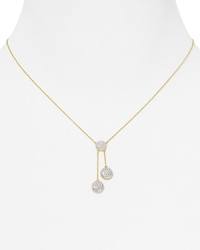 Thoughtfully designed and meticulously handcrafted, this Crislu necklace features a pair of delicate cubic zirconia stones suspended from a 18-karat gold chain. Thoughtfully designed and meticulously handcrafted, this Crislu necklace features a pair of delicate cubic zirconia stones suspended from a 18-karat gold chain.