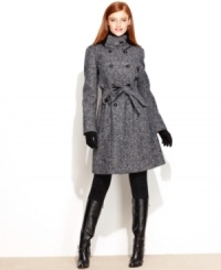 Gorgeously nubby tweed combined with a flared, feminine silhouette equal a can't miss coat, from Calvin Klein. A unique knit tab collar rounds out the look. Gorgeously nubby tweed combined with a flared, feminine silhouette equal a can't miss coat, from Calvin Klein. A unique knit tab collar rounds out the look.