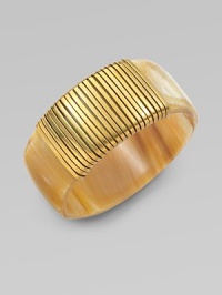 A wide, smooth bangle of natural horn, wrapped in the golden glow of flat brass wire.Natural cow hornBrassDiameter, about 2¾ImportedPlease note: Color and design may vary. A wide, smooth bangle of natural horn, wrapped in the golden glow of flat brass wire.Natural cow hornBrassDiameter, about 2¾ImportedPlease note: Color and design may vary.