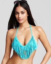 There's something fashion-forward about L*Space's fringed bikini. Hinting at flirtatious but wholly feminine, this daring suit is destined to stun when you shimmy in the sun.