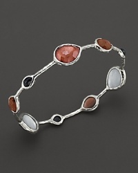 Faceted doublets of clear quartz, almond, smoky quartz and mother-of-pearl in a sterling silver bangle. From the Ippolita Rock Candy Collection. Faceted doublets of clear quartz, almond, smoky quartz and mother-of-pearl in a sterling silver bangle. From the Ippolita Rock Candy Collection.