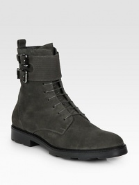 A refined boot for the season, crafted in a luxurious suede upper with lace-up and double-buckle detail.Suede upperLeather liningPadded insoleRubber soleMade in Italy A refined boot for the season, crafted in a luxurious suede upper with lace-up and double-buckle detail.Suede upperLeather liningPadded insoleRubber soleMade in Italy