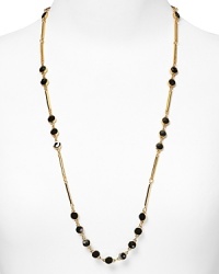 kate spade new york styles scattered simplicity with this long-link necklace, cast in 12 karat gold plate and accented by a smattering of bold stones. kate spade new york styles scattered simplicity with this long-link necklace, cast in 12 karat gold plate and accented by a smattering of bold stones.