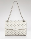 Rebecca Minkoff's shoulder bag is reason to break up with your day bag and have an affair. The silvery studs are a little bit dangerous, while ladylike white leather never kisses and tells.