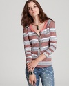 Enrich your casual weekend wardrobe with this Free People henley and your favorite pair of jeans.