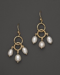 Freshwater pearls add rich luster to links of 14K yellow gold. By Nancy B.