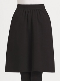 Feminine jersey skirt with soft gathering at waistband. Self waistbandGathered frontSide zipper pocketsConcealed back zipAbout 22'' long70% viscose/25% polyamide/5% elastaneDry cleanImported of Italian fabricModel shown is 5'11 (180cm) wearing US size 4. Feminine jersey skirt with soft gathering at waistband. Self waistbandGathered frontSide zipper pocketsConcealed back zipAbout 22'' long70% viscose/25% polyamide/5% elastaneDry cleanImported of Italian fabricModel shown is 5'11 (180cm) wearing US size 4.