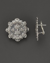 Intricately wrought sterling silver leaves form elegant earrings. By Buccellati. Intricately wrought sterling silver leaves form elegant earrings. By Buccellati.