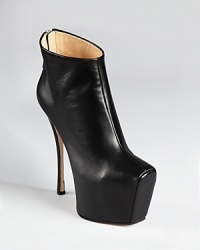Famed footwear designer Giuseppe Zanotti breaks the mold once again with the Ambra Architectural booties. It's never been easier to step into the shoes of a statement-making celeb--these standout shoes are sure to make you feel like one. Famed footwear designer Giuseppe Zanotti breaks the mold once again with the Ambra Architectural booties. It's never been easier to step into the shoes of a statement-making celeb--these standout shoes are sure to make you feel like one.
