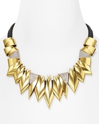 Rock a heavy metal: This Juicy Couture necklace works an edgy vibe, accented by a collar of gleaming spikes with a leather cord as the compliment. Rock a heavy metal: This Juicy Couture necklace works an edgy vibe, accented by a collar of gleaming spikes with a leather cord as the compliment.