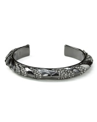 Embedded with delicate crystal petals, Giles & Brother's hematite-plated cuff is hardcore yet feminine. Shy away from the urge to stack, this style is best all by itself. Embedded with delicate crystal petals, Giles & Brother's hematite-plated cuff is hardcore yet feminine. Shy away from the urge to stack, this style is best all by itself.