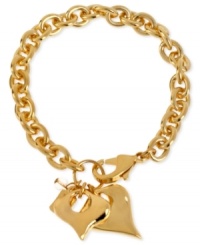 Robert Lee Morris breaks out the charm in this bracelet. Crafted from gold-tone mixed metal, out-of-the-ordinary heart shapes take the accessory beyond the basics. Approximate length: 7-1/2 inches. Approximate drop: 1 inch. Robert Lee Morris breaks out the charm in this bracelet. Crafted from gold-tone mixed metal, out-of-the-ordinary heart shapes take the accessory beyond the basics. Approximate length: 7-1/2 inches. Approximate drop: 1 inch.
