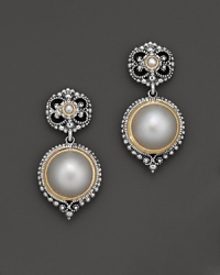 Gleaming pearls add moonlit beauty to 18K yellow gold and sterling silver earrings from Konstantino. Gleaming pearls add moonlit beauty to 18K yellow gold and sterling silver earrings from Konstantino.