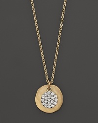 Diamonds in an 14K gold pendant necklace from Meira T. Diamonds in an 14K gold pendant necklace from Meira T.