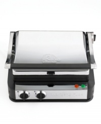 Great cooking requires versatility. That's why Wolfgang Puck has designed this chrome-plated, customizable grill. With 3 interchangeable cooking plates and 3 innovative cooking positions – fixed, float or open flat – this appliance is the ultimate in kitchen resourcefulness. One-year warranty. Model BCGL0050. Great cooking requires versatility. That's why Wolfgang Puck has designed this chrome-plated, customizable grill. With 3 interchangeable cooking plates and 3 innovative cooking positions – fixed, float or open flat – this appliance is the ultimate in kitchen resourcefulness. One-year warranty. Model BCGL0050.