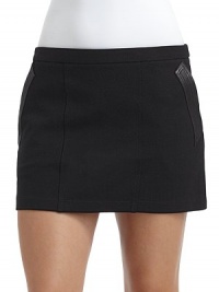 THE LOOKNarrow elastic waistbandDual leather-trimmed slash pocketsSeamed detailsBack zipperTHE FITAbout 15 longTHE MATERIALShell: rayon/nylon/spandexCombo: leatherBack: cotton/elastaneCARE & ORIGINDry cleanImportedModel shown is 5'10 (172½cm) wearing US size Small. THE LOOKNarrow elastic waistbandDual leather-trimmed slash pocketsSeamed detailsBack zipperTHE FITAbout 15 longTHE MATERIALShell: rayon/nylon/spandexCombo: leatherBack: cotton/elastaneCARE & ORIGINDry cleanImportedModel shown is 5'10 (172½cm) wearing US size Small.