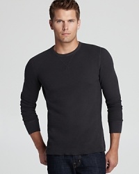 Transition to the weekend with a relaxed waffle knit crewneck that's comfy and cool every time you wear it. Transition to the weekend with a relaxed waffle knit crewneck that's comfy and cool every time you wear it.