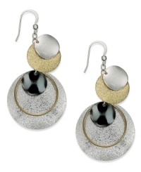 Make a triple play in this chic earrings from Style&co. With a tri-tone finish, the disc pendants make a unique statement. Crafted in silver tone, gold tone and hematite tone mixed metal. Approximate drop: 2-1/4 inches. Make a triple play in this chic earrings from Style&co. With a tri-tone finish, the disc pendants make a unique statement. Crafted in silver tone, gold tone and hematite tone mixed metal. Approximate drop: 2-1/4 inches.