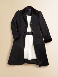 Our luxury princess coat in refined wool is tailored to perfection with classic hallmark details in a flattering fit and elongated silhouette.Notched velvet collar converts to a button-through Mandarin collarLong puffed sleeves with velvet cuffsButton-frontPrincess seamsWelt pocket at chestFlap-welt pockets at hipsFully linedWoolDry cleanImportedNecklace shown not sold Please note: Number of buttons may vary depending on size ordered. Our luxury princess coat in refined wool is tailored to perfection with classic hallmark details in a flattering fit and elongated silhouette.Notched velvet collar converts to a button-through Mandarin collarLong puffed sleeves with velvet cuffsButton-frontPrincess seamsWelt pocket at chestFlap-welt pockets at hipsFully linedWoolDry cleanImportedNecklace shown not sold Please note: Number of buttons may vary depending on size ordered.