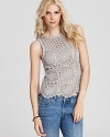 Allover crochet illuminates a subtle shade for a Juicy Couture top brimming with artisan appeal. Team with faded jeans for vintage nirvana.