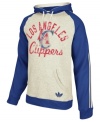 Keep warm as you cheer and rant for the LA Clippers in this pullover hoodie by adidas.