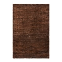 Inspired by the luster of European velvet, artisans create this Ralph Lauren rug's rich heathered texture by blending long threads of different hand-spun yarns--a technique known as abrash.Available in five spice hued colorways. Inspired by the luster of European velvet, artisans create this Ralph Lauren rug's rich heathered texture by blending long threads of different hand-spun yarns--a technique known as abrash.Available in five spice hued colorways.